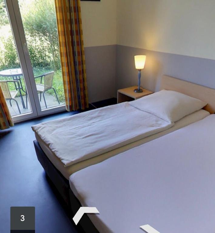 Postel nebo postele na pokoji v ubytování Frisco