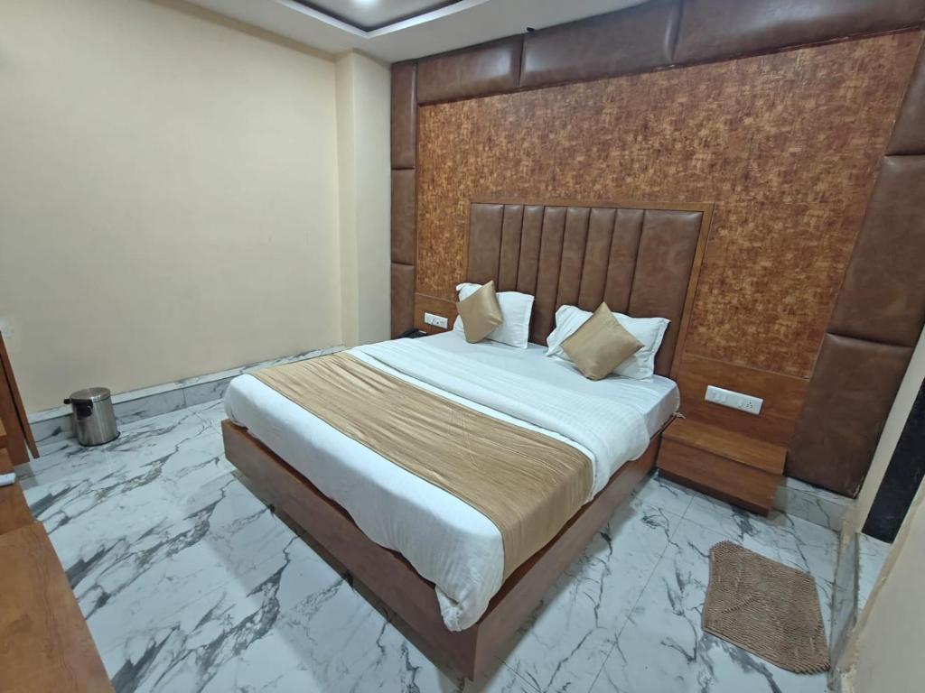 Postel nebo postele na pokoji v ubytování Hotel Royal King