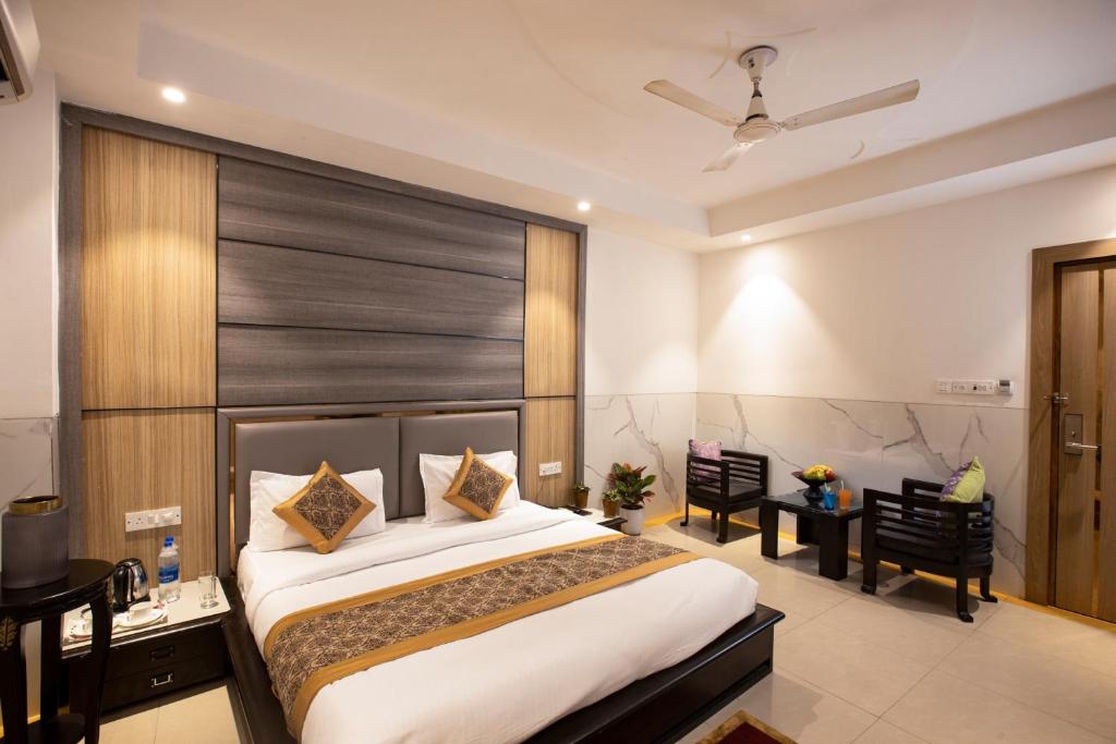 Postel nebo postele na pokoji v ubytování Hotel DELHI 37 by STAR GROUP