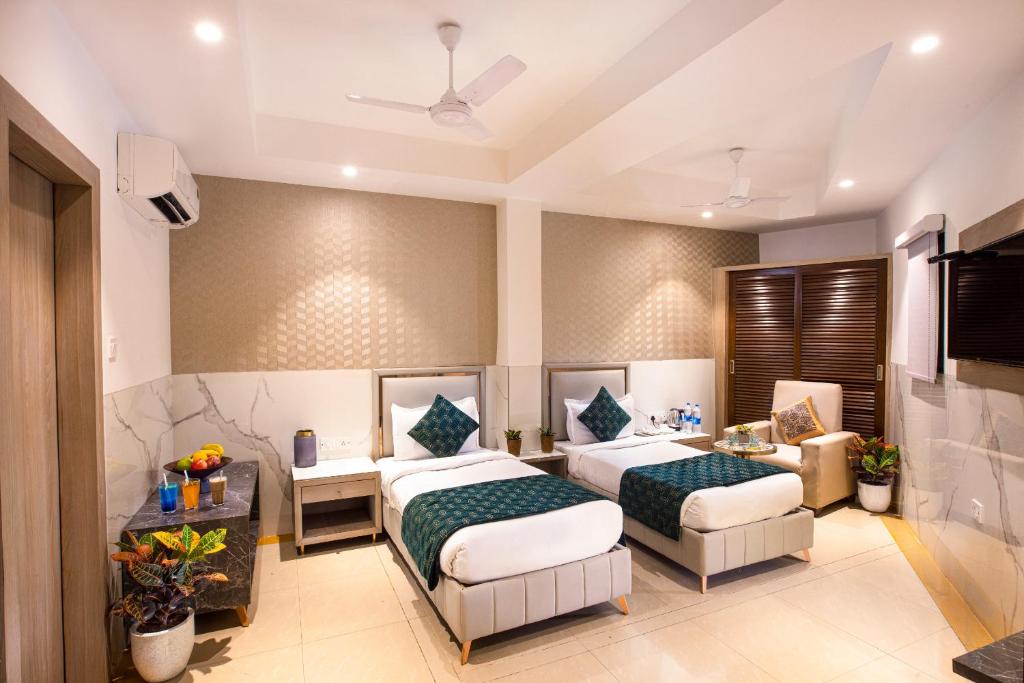 Postel nebo postele na pokoji v ubytování Hotel DELHI 37 by STAR GROUP