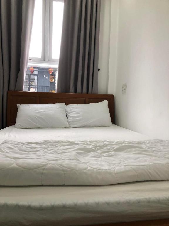 Postel nebo postele na pokoji v ubytování Motel Minh Thảo