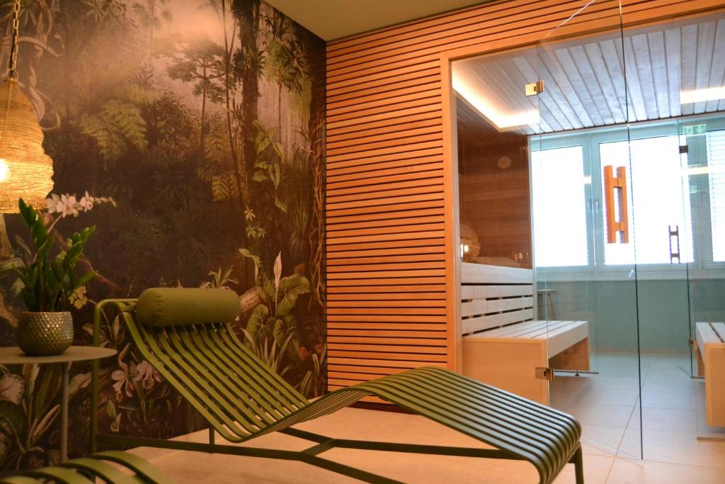 Postel nebo postele na pokoji v ubytování Seaside Residenz Hotel Chemnitz