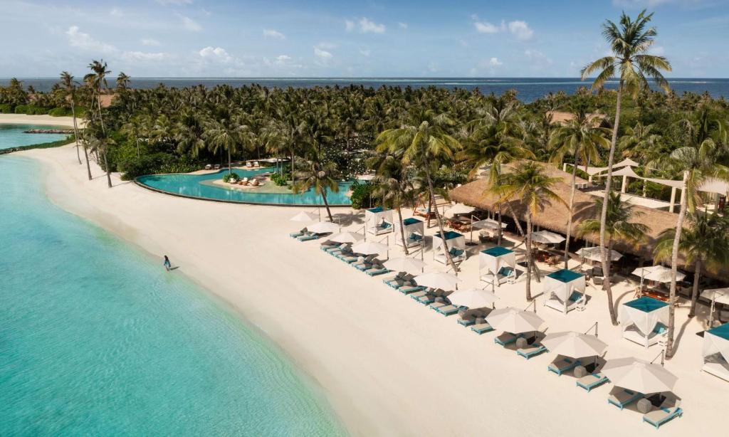 an aerial view of the beach at a resort at Waldorf Astoria Maldives Ithaafushi in South Male Atoll