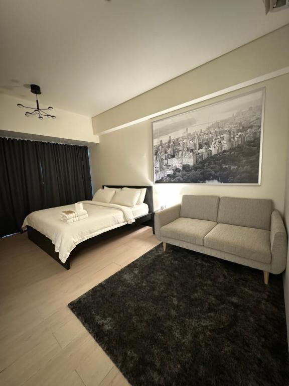 Postel nebo postele na pokoji v ubytování 81 Newport Blvd Cluster 4 Unit B 3rd flr by Rechelle Nunag