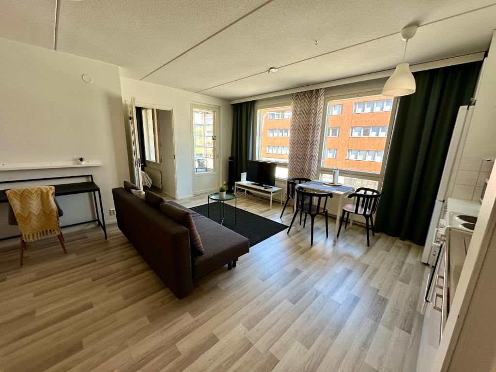 Гостиная зона в Modern two-room flat with balcony near metro