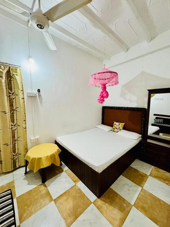 Postel nebo postele na pokoji v ubytování Dambulla Tourist Resort