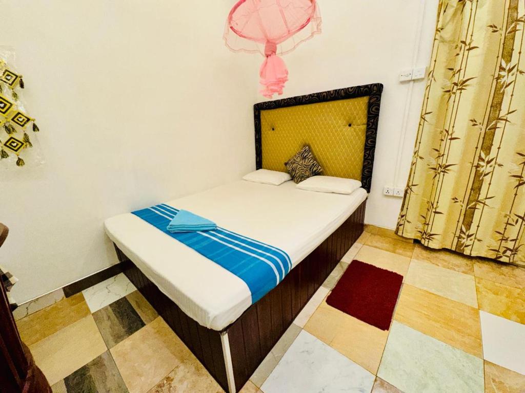 Postel nebo postele na pokoji v ubytování Dambulla Tourist Resort