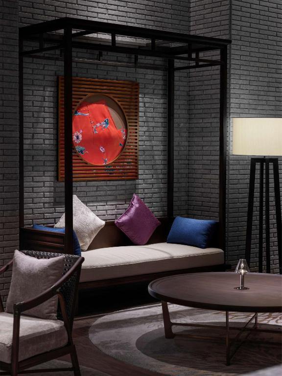 Posezení v ubytování Hilton Shanghai Songjiang Guangfulin