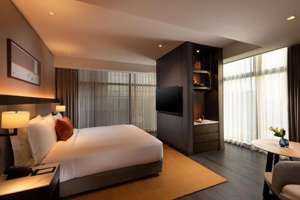 Postel nebo postele na pokoji v ubytování DoubleTree By Hilton Seoul Pangyo