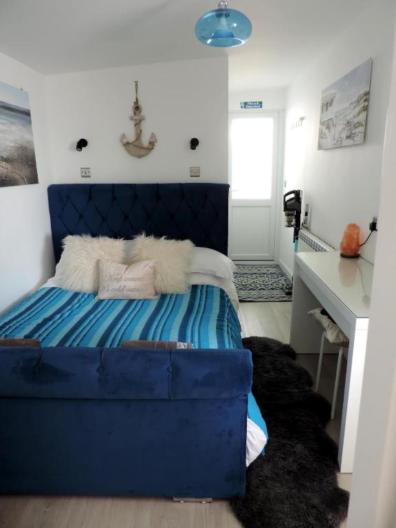 Postel nebo postele na pokoji v ubytování Seaview Escape
