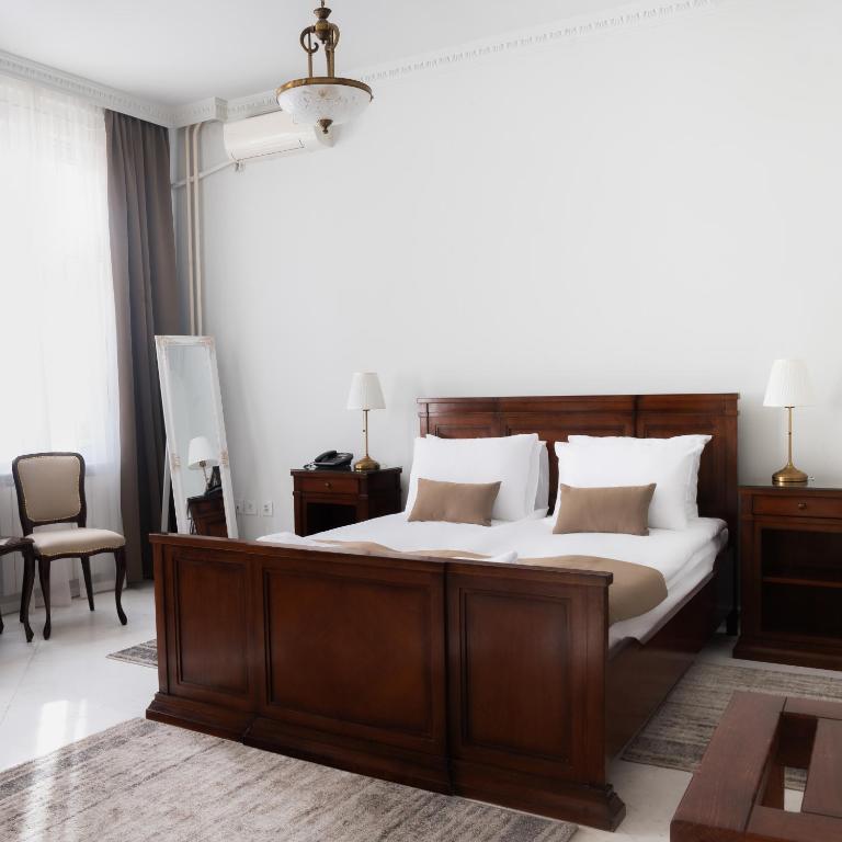 Postel nebo postele na pokoji v ubytování Hotel Jardin