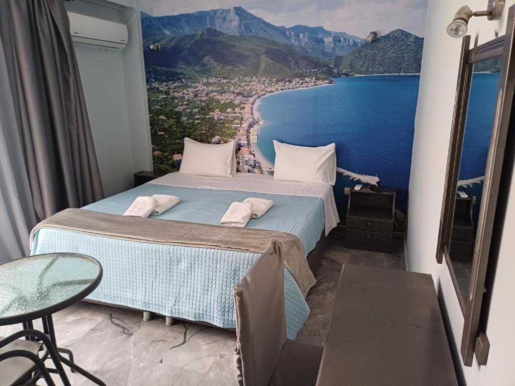 Postel nebo postele na pokoji v ubytování Enalion Beach Hotel