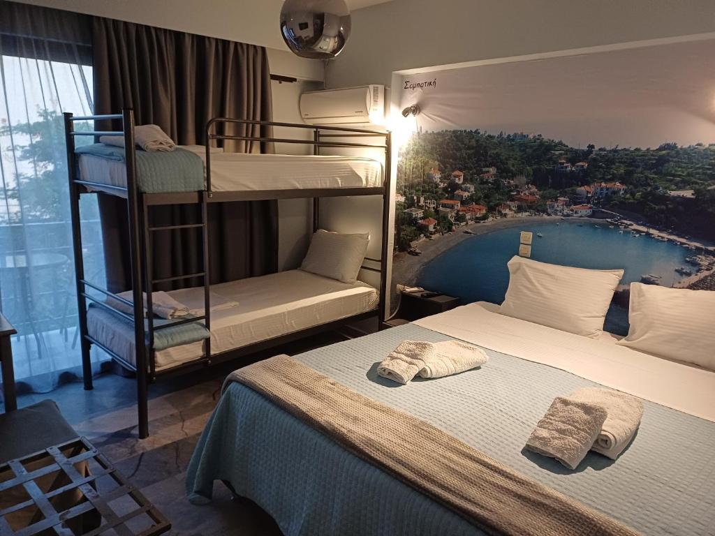 Postel nebo postele na pokoji v ubytování Enalion Beach Hotel