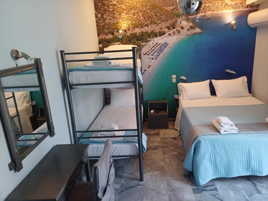 Postel nebo postele na pokoji v ubytování Enalion Beach Hotel