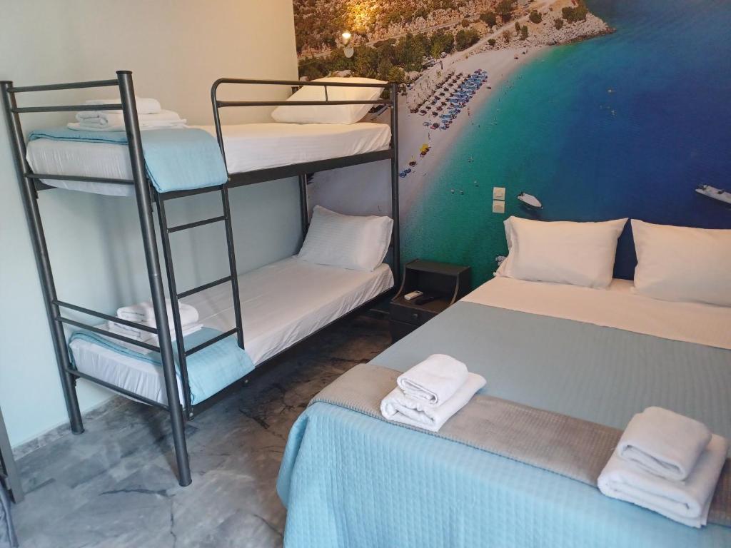 Postel nebo postele na pokoji v ubytování Enalion Beach Hotel