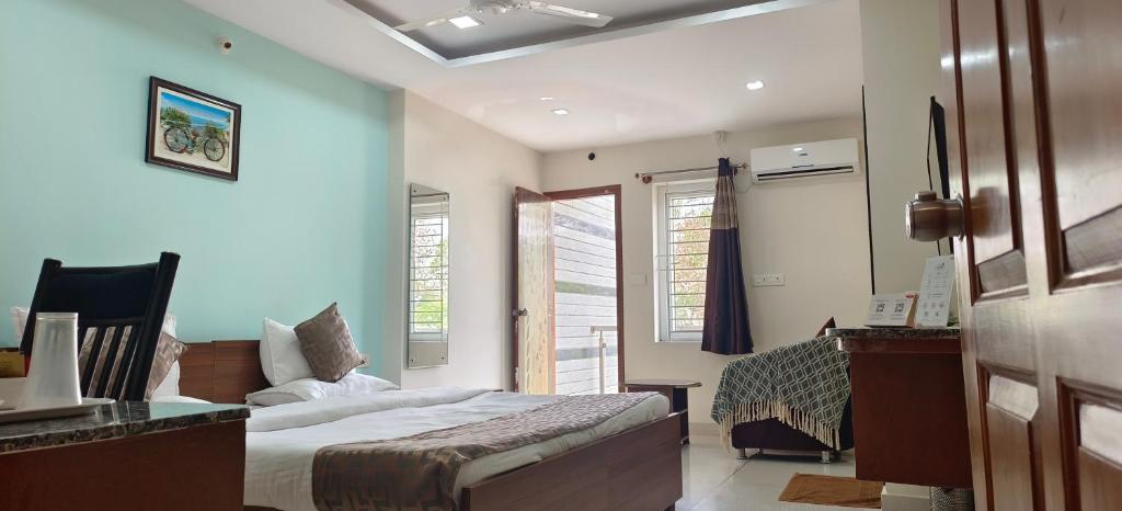 Postel nebo postele na pokoji v ubytování Sugamya Corner Guesthouse