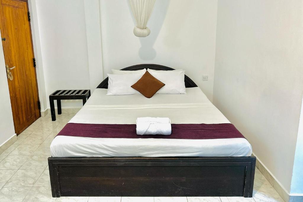 Postel nebo postele na pokoji v ubytování Gamagedara Resort