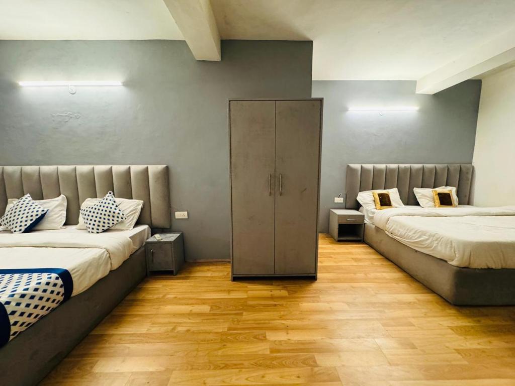 Postel nebo postele na pokoji v ubytování Hotel new # Link Way # Near Zing bus stand