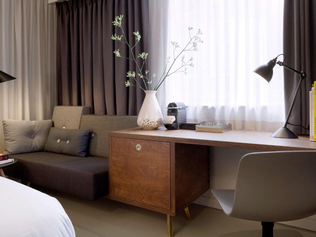 INK Hotel Amsterdam - MGallery Collectionにあるシーティングエリア