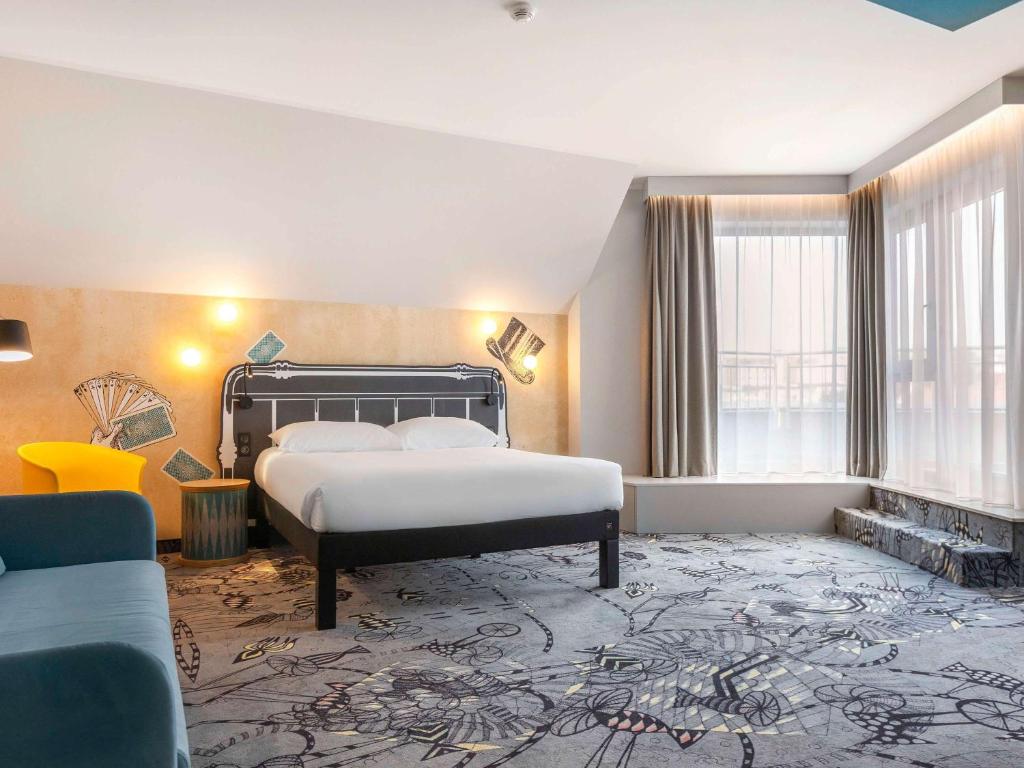 Postel nebo postele na pokoji v ubytování ibis Styles Szczecin Stare Miasto