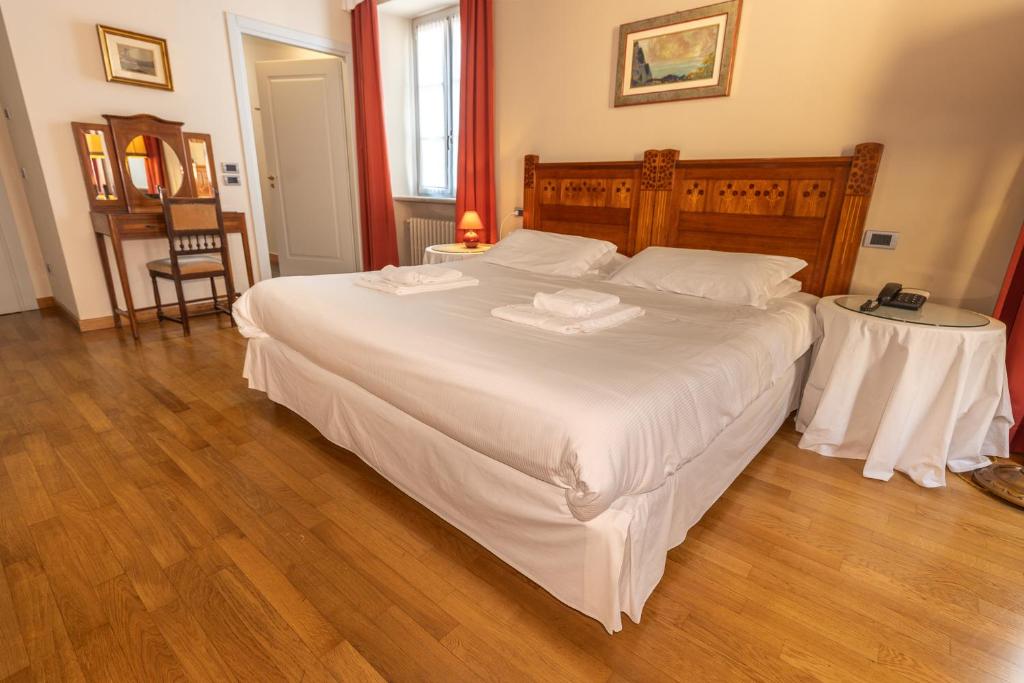 Postel nebo postele na pokoji v ubytování Castelbourg