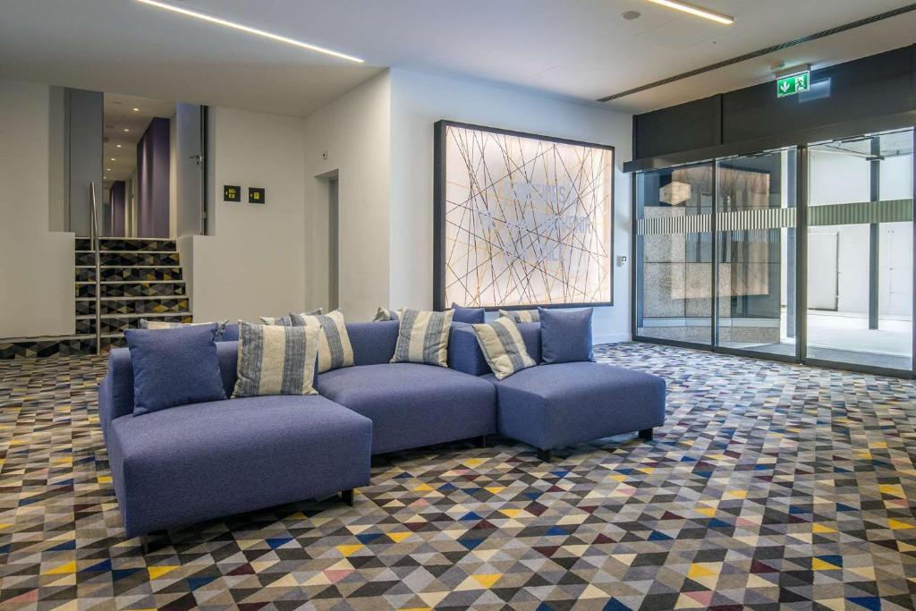 Posezení v ubytování Hampton By Hilton Locarno