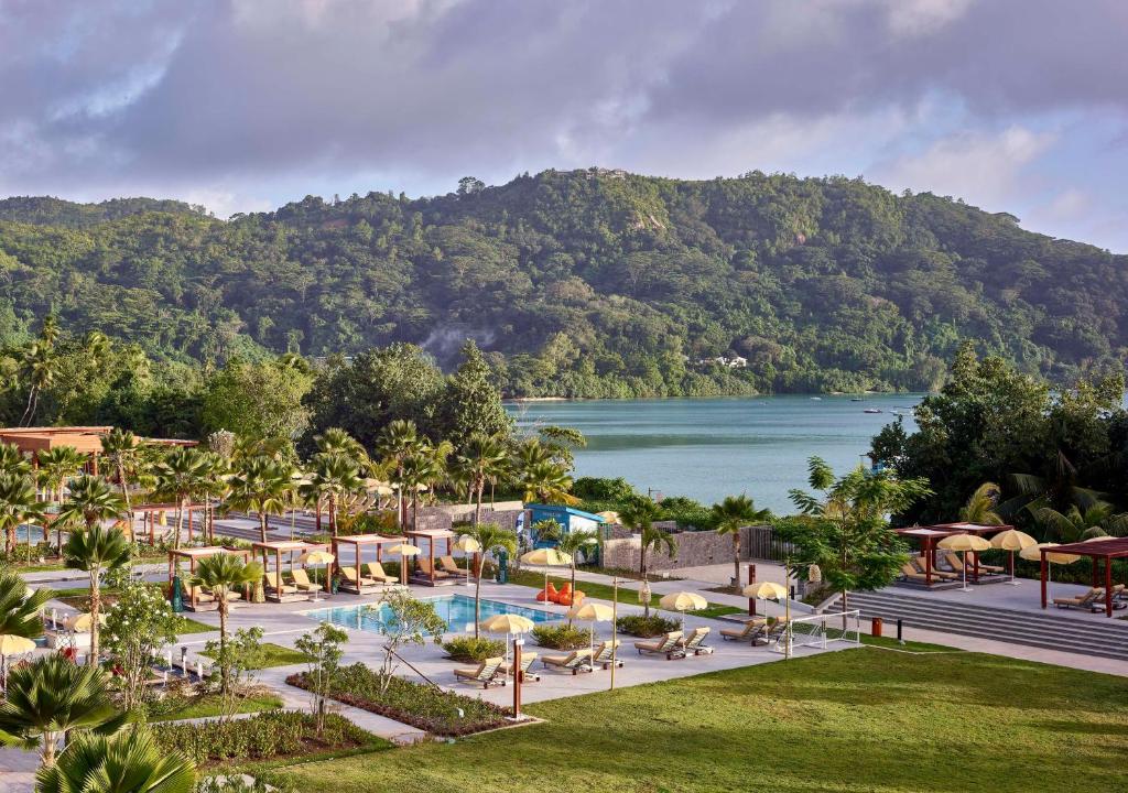 an image of a resort with a view of a lake at Canopy By Hilton Seychelles Resort in Anse a La Mouche