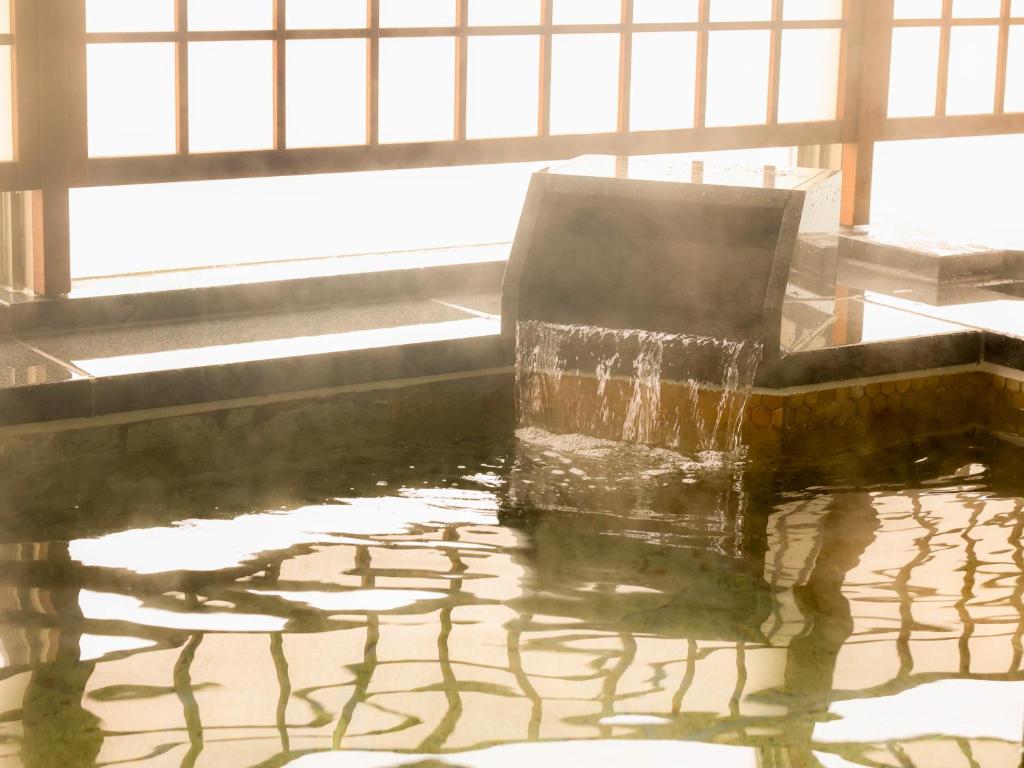 Posezení v ubytování Tennen Onsen Taho-no-Yu Dormy Inn Niigata