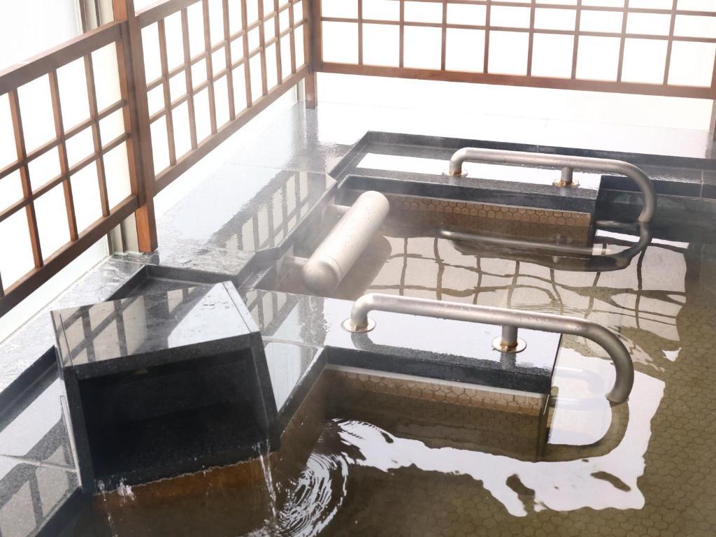 Posezení v ubytování Tennen Onsen Taho-no-Yu Dormy Inn Niigata