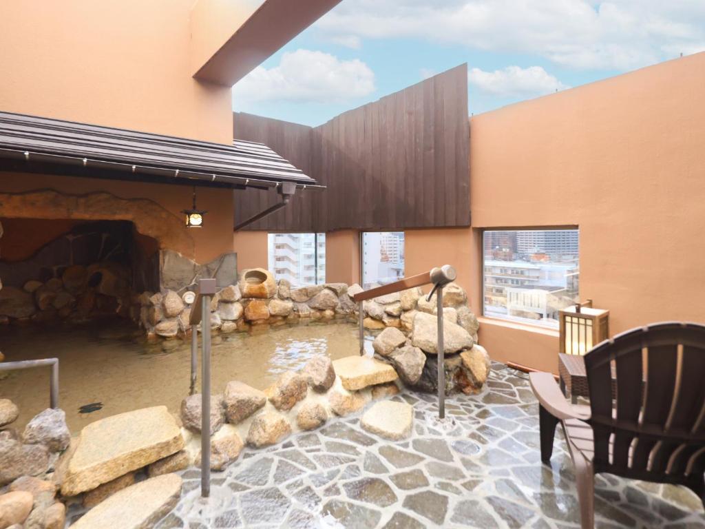 Posezení v ubytování Tennen Onsen Taho-no-Yu Dormy Inn Niigata