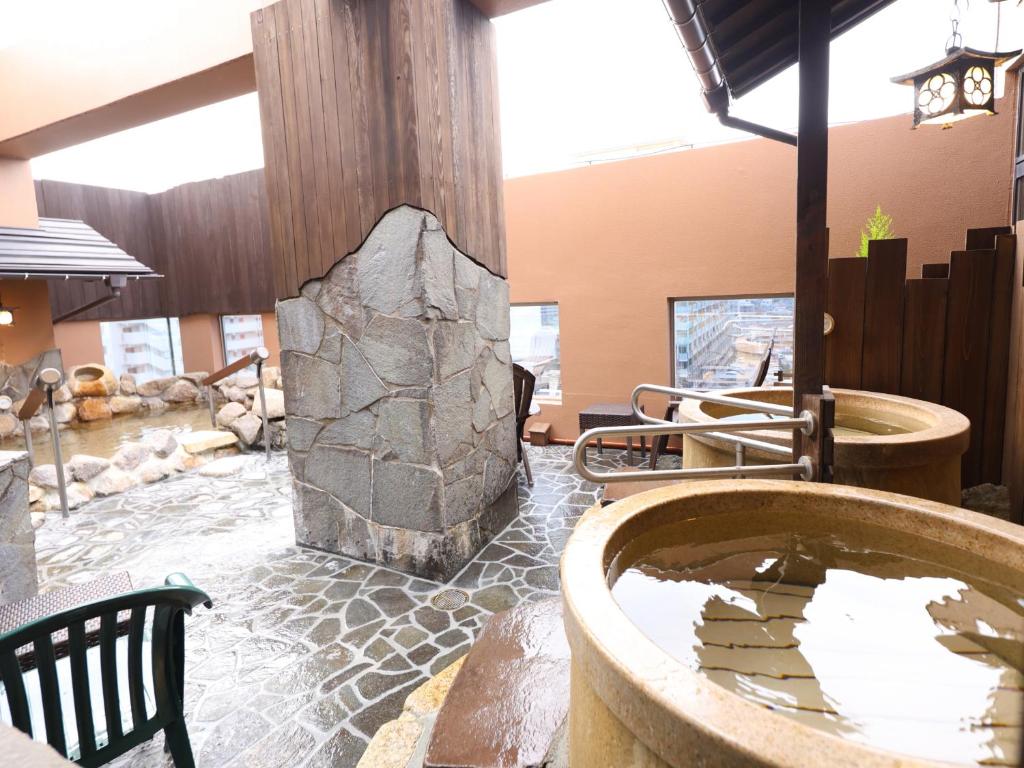 Posezení v ubytování Tennen Onsen Taho-no-Yu Dormy Inn Niigata