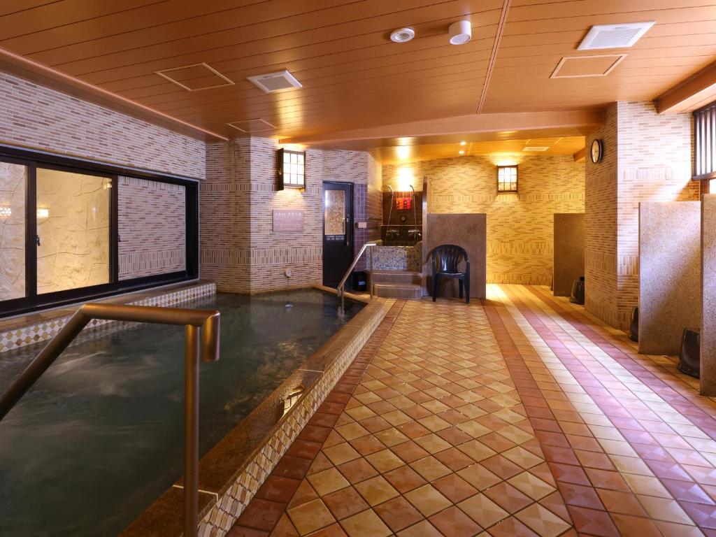 Posezení v ubytování Tennen Onsen Taho-no-Yu Dormy Inn Niigata