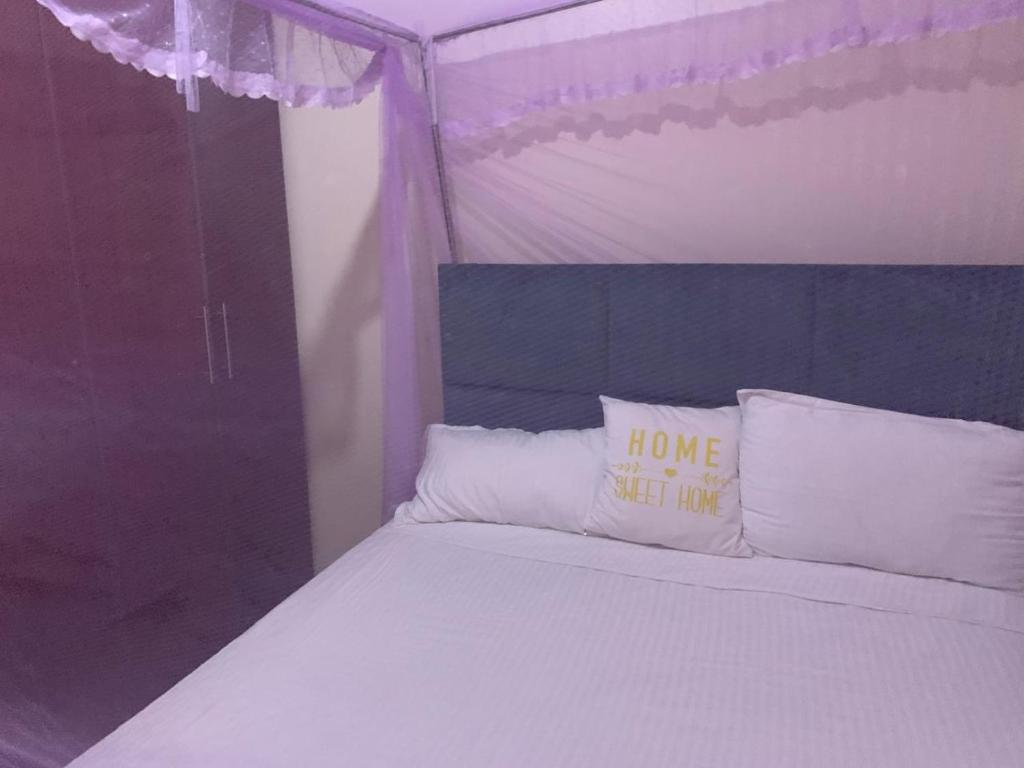 Postel nebo postele na pokoji v ubytování Angie's palace