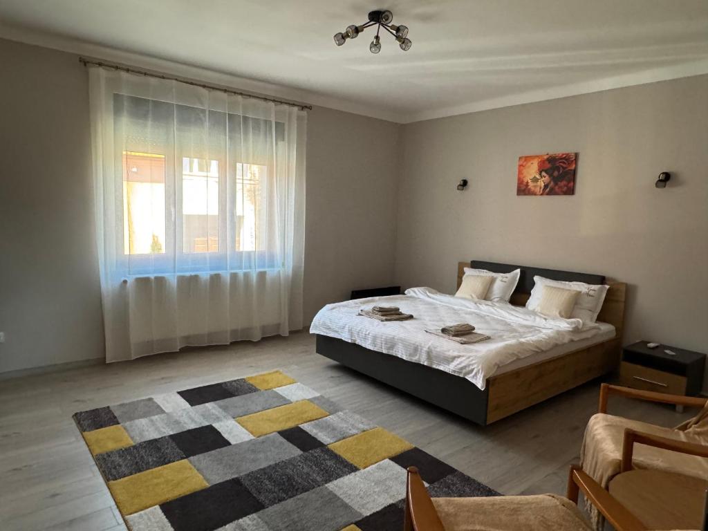 Postel nebo postele na pokoji v ubytování Kyuka House