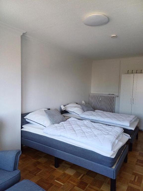 Postel nebo postele na pokoji v ubytování Gästezimmer Ilmenaudeich