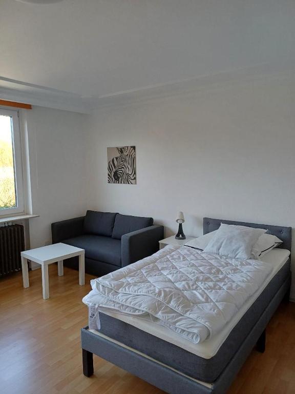 Postel nebo postele na pokoji v ubytování Gästezimmer Ilmenaudeich