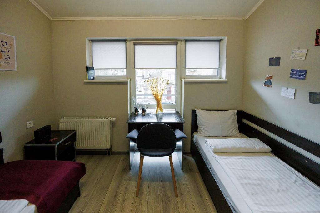 Ліжко або ліжка в номері Hotel Dolynskiy