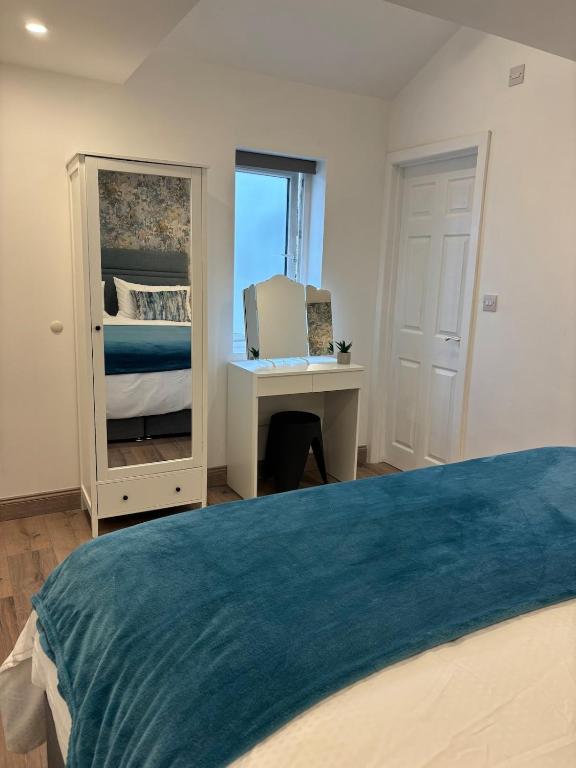 Postel nebo postele na pokoji v ubytování Kildare Cosy Apartment