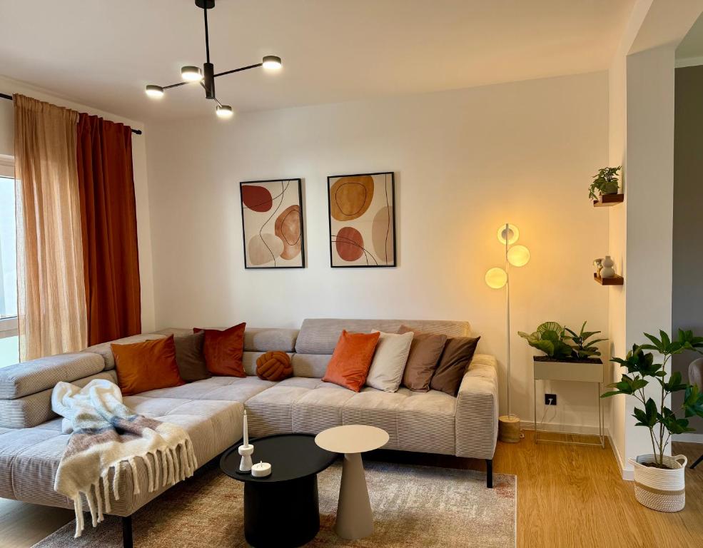 a living room with a couch and a table at Weiller HOME in Leverkusen
