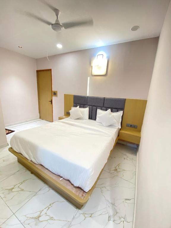 Postel nebo postele na pokoji v ubytování Hotel Elite