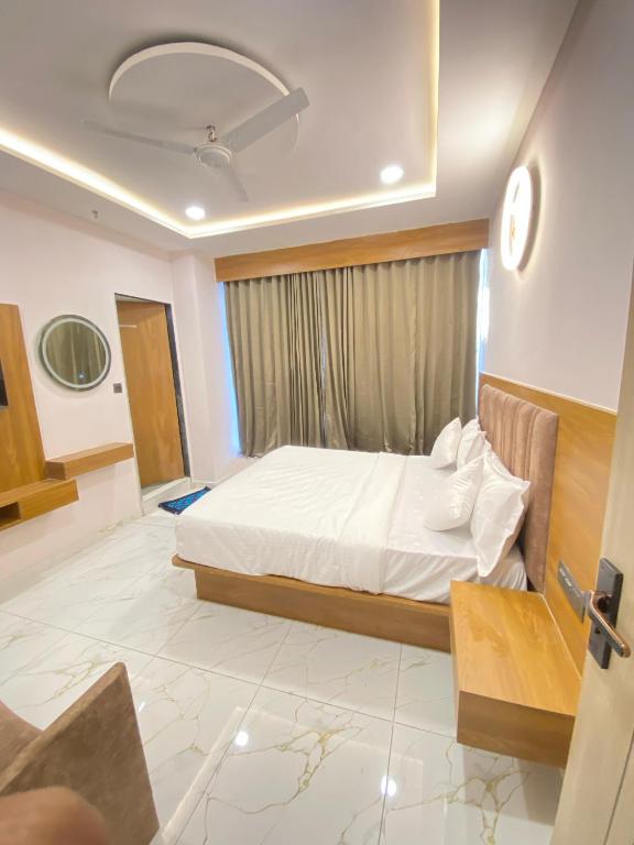 Postel nebo postele na pokoji v ubytování Hotel Elite