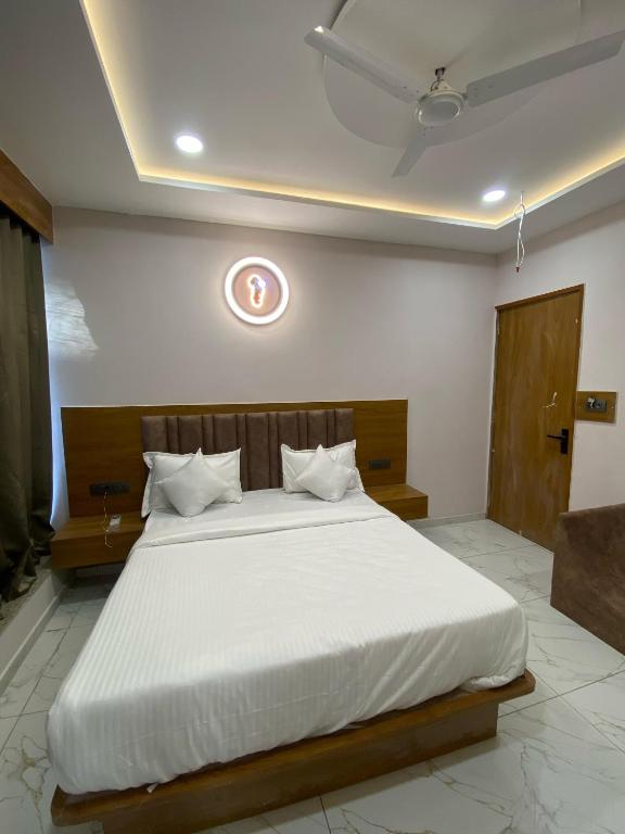 Postel nebo postele na pokoji v ubytování Hotel Elite