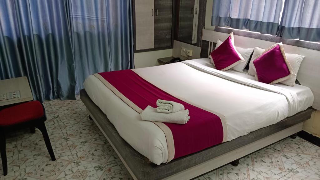 Postel nebo postele na pokoji v ubytování Hotel Kiara Eshosans Palace