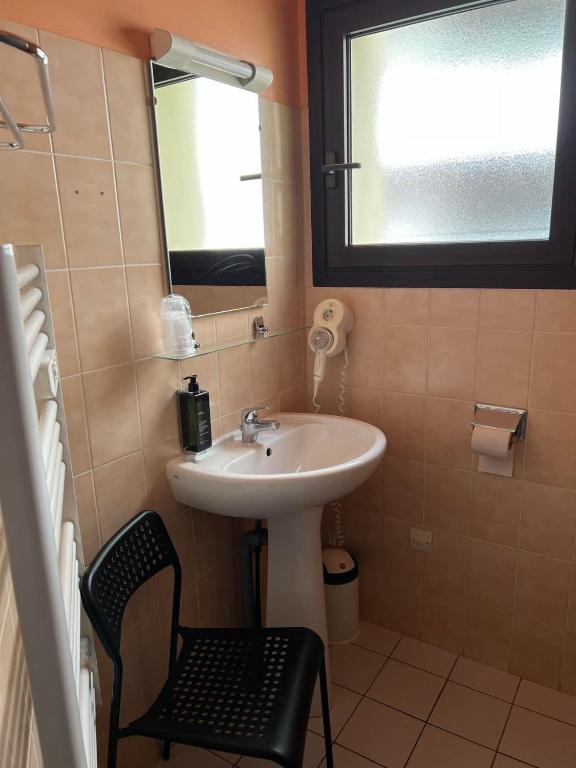 Koupelna v ubytování Au Bec Fin Hôtel
