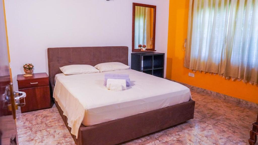 Postel nebo postele na pokoji v ubytování sunvilla