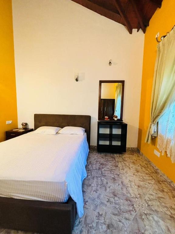 Postel nebo postele na pokoji v ubytování sunvilla
