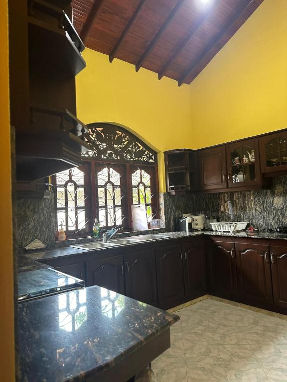 Kuchyň nebo kuchyňský kout v ubytování sunvilla