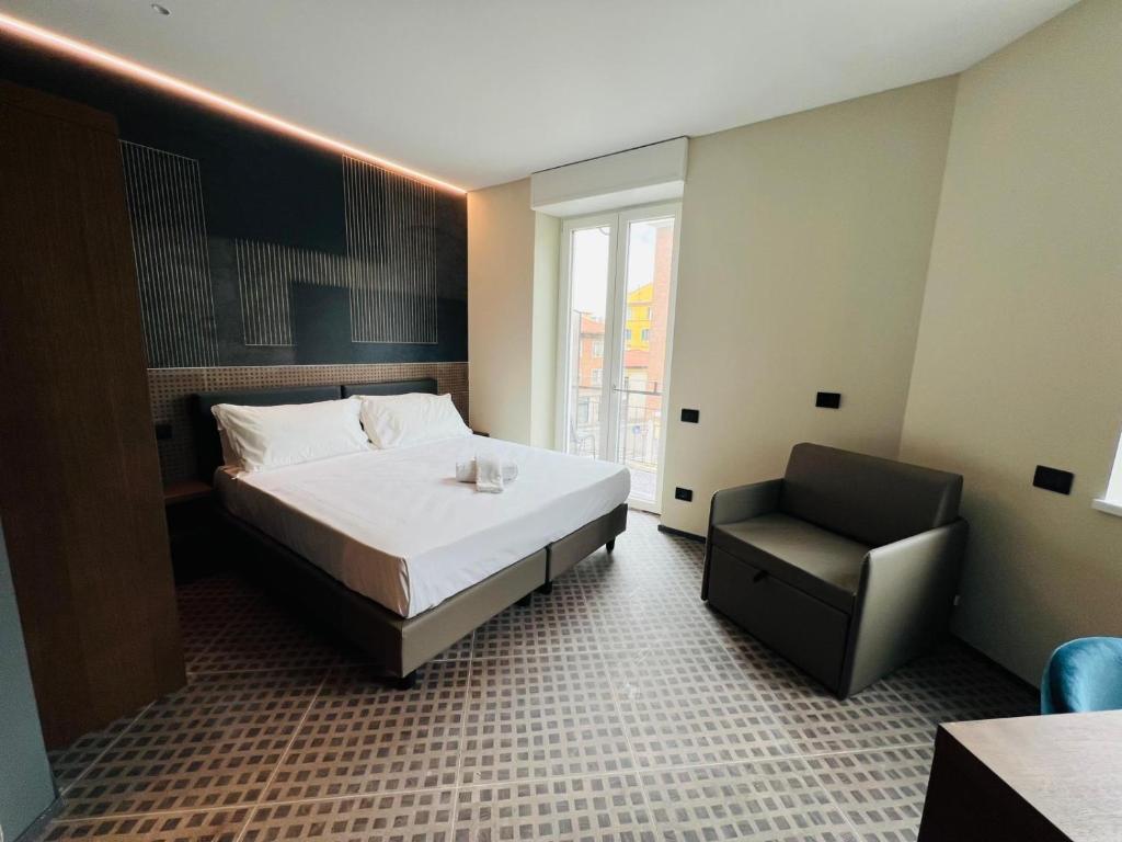 Postel nebo postele na pokoji v ubytování WEGA Hotel Verona