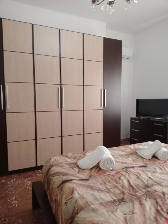 Postel nebo postele na pokoji v ubytování B&B Lo Scrigno