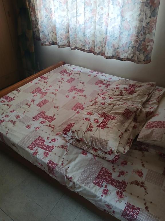 Llit o llits en una habitació de Central Apartement